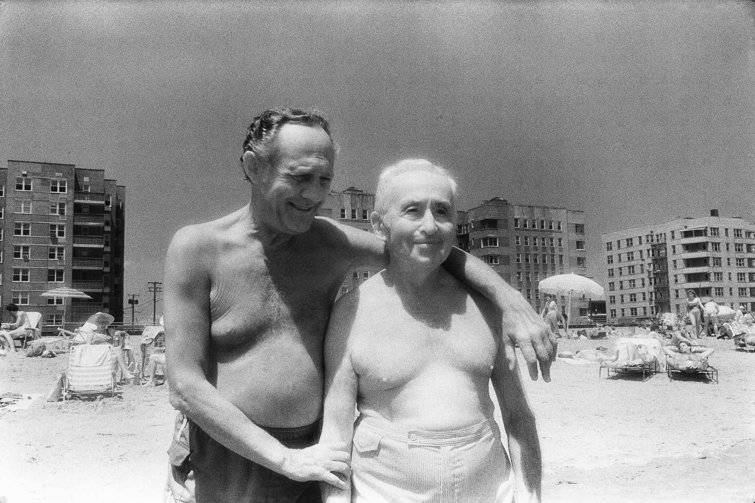 Barbara Alper- Photo of two men as friends on Rockaway Beach NYC